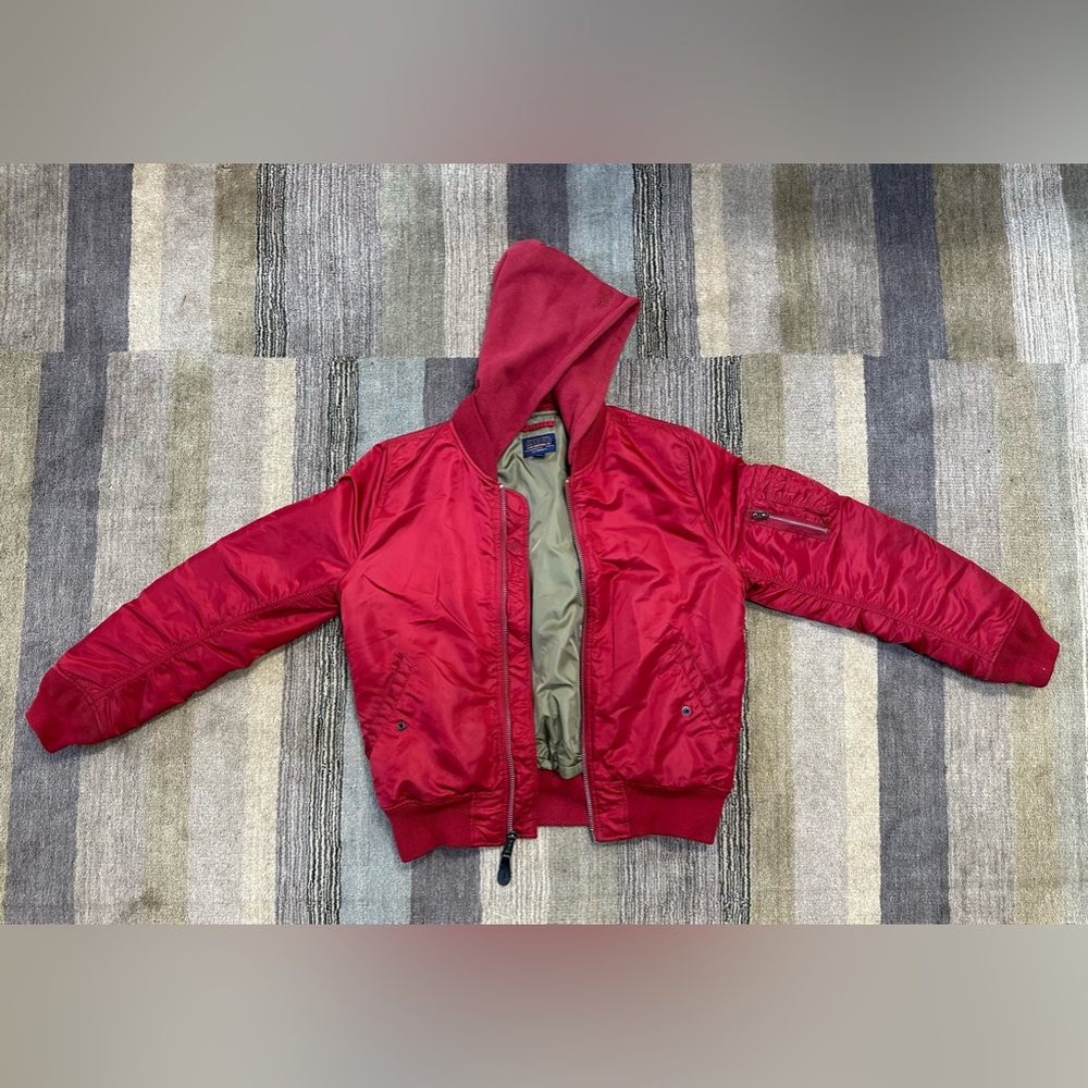 Red Alpha Industries jacket.